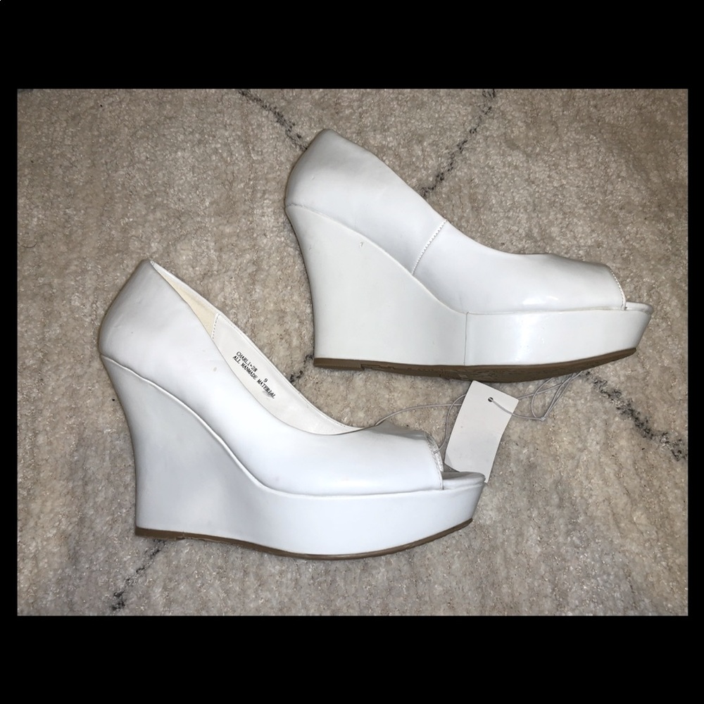 White wedge heels.